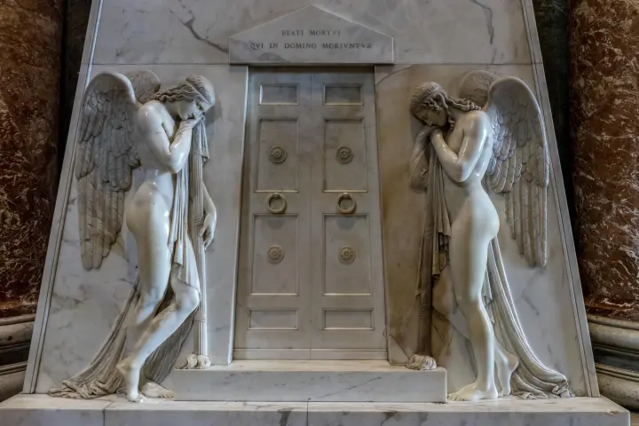 a group of shoes on the side of a building