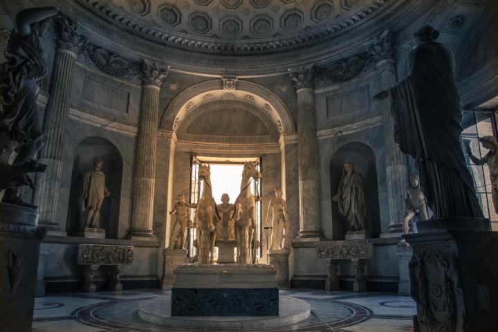a church with a clock on the side of a building
