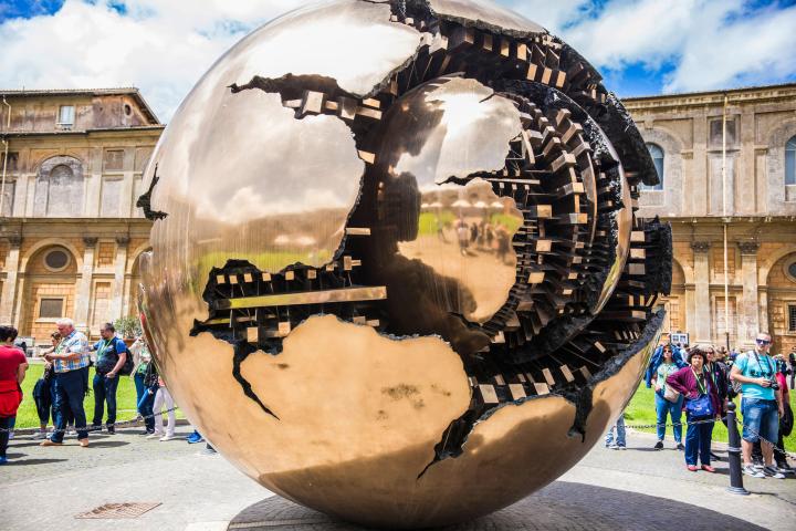 a group of people standing in front of a building