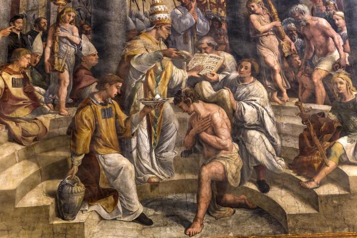 a group of people sitting on the ground