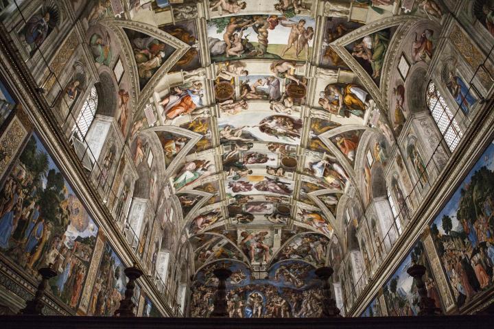 a close up of a church with Sistine Chapel in the background