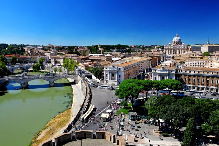 a large body of water with a city in the background