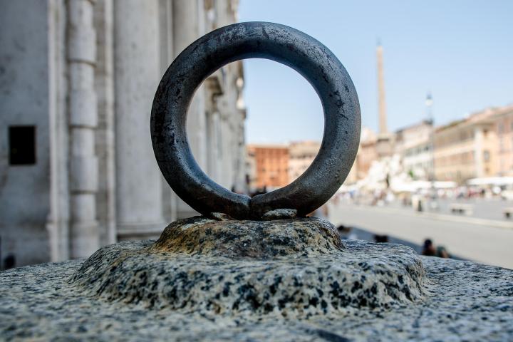 a bird sitting on top of a building