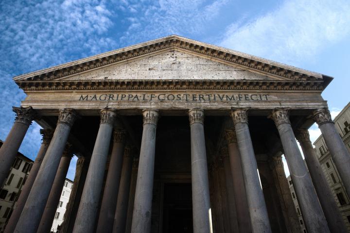 a large stone building with Pantheon, Rome in the background
