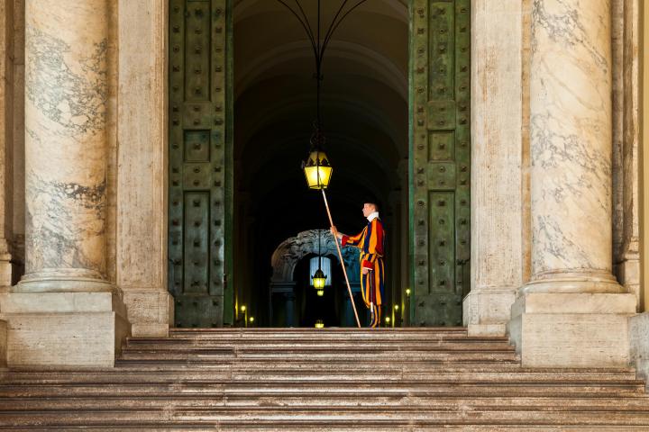 a statue in front of a building