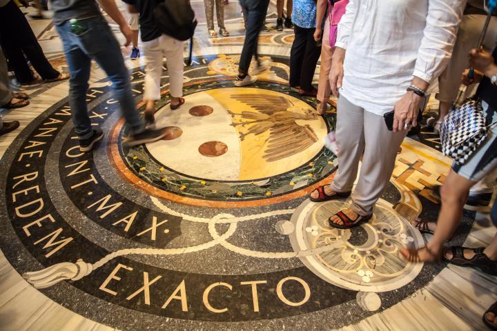 a group of people standing in front of a crowd