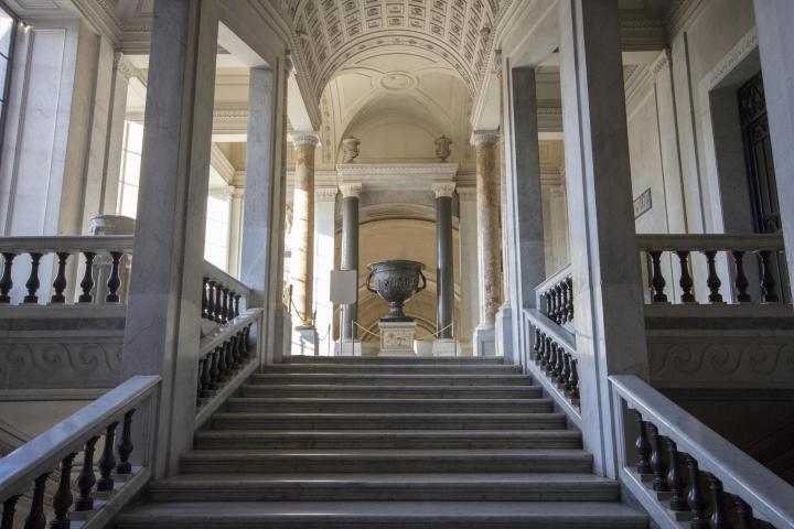 a building with a metal fence