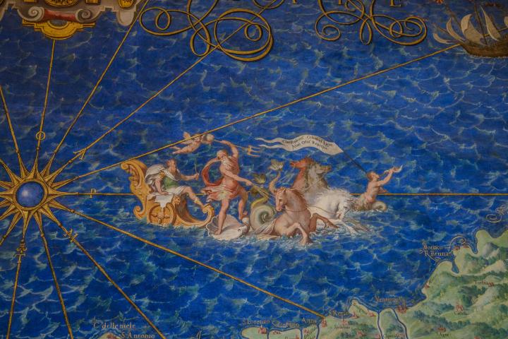 a group of people standing on top of a map