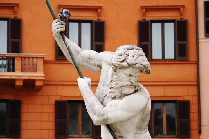 a horse statue in front of a building