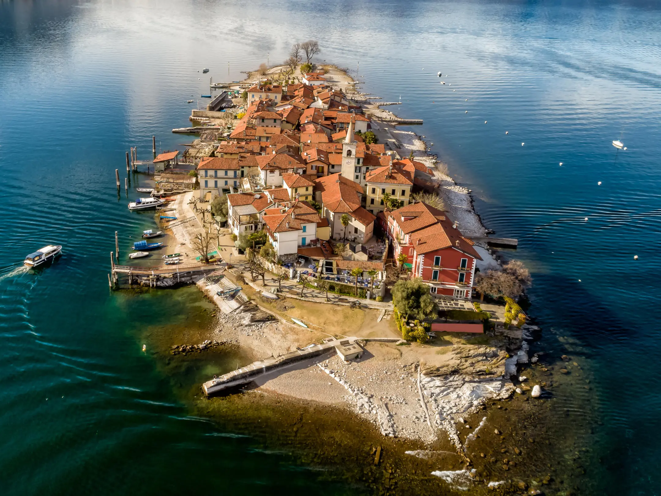 a body of water with a city in the background