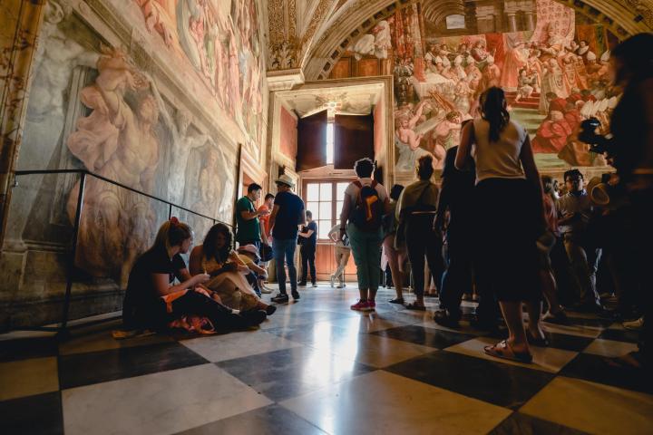 a group of people standing in a room