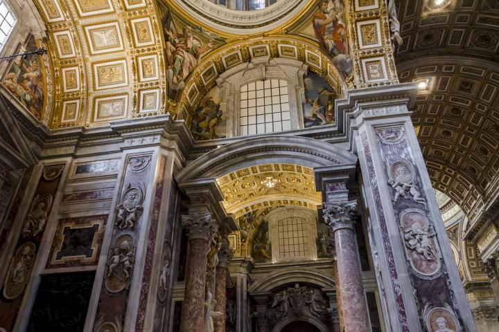 a large clock mounted to the side of a building