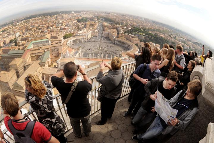 a group of people standing in front of a crowd