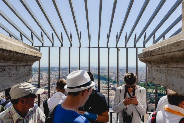 a group of people standing in front of a building