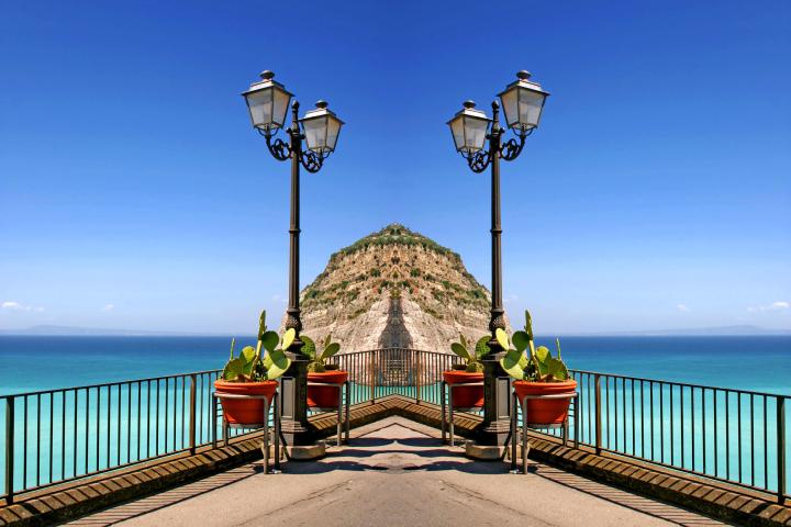a bench overlooking the ocean