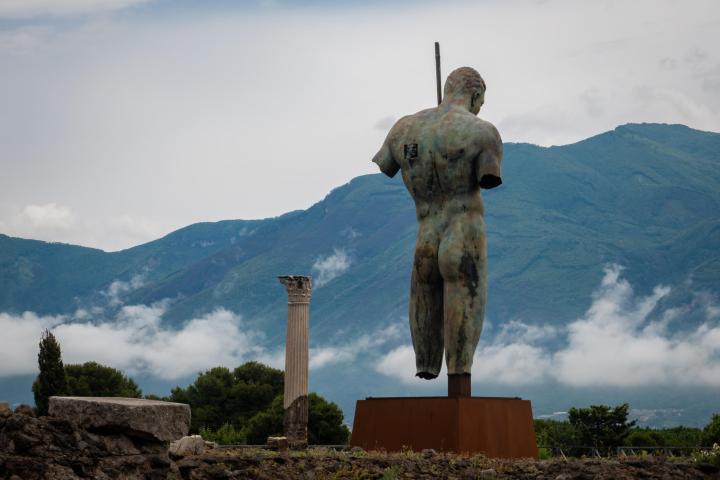 a building with a mountain in the background