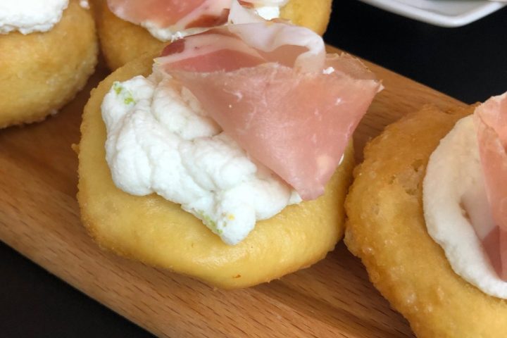 a sandwich sitting on top of a wooden table