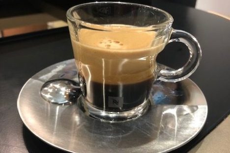 a cup of coffee on a table