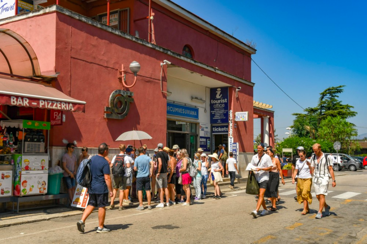 a group of people walking down a street