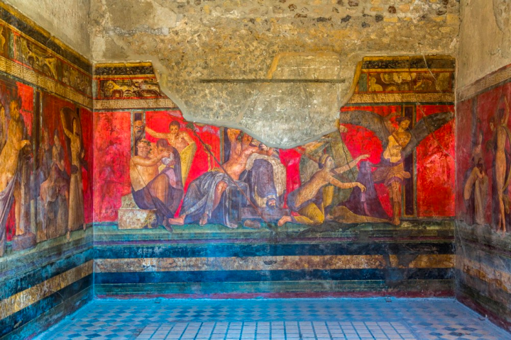 a painting on the side of Villa of the Mysteries
