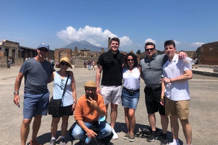 a group of people posing for the camera